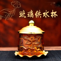 The glass is dedicated to the glass for the cup of the Buddhas cup for the holy water the home of the house Buddha before the Buddhas Buddhist supplies.