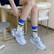 Alphabet net red stockings women wear ins tide pure cotton Zhuji mid-tube socks mens sports fake two-piece long tube autumn and winter