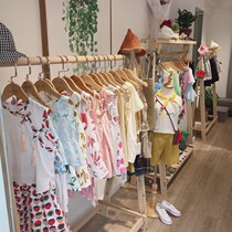 Special exhibition rack for childrens clothing stores Hanging Clothes Hanger Solid Wood Middle Island Shelf Womens Landing Shelf Display Shelf Furnishing