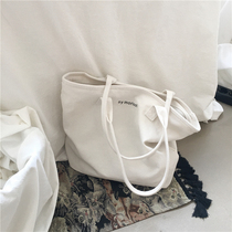  2020 new Korean version of simple and wild white large-capacity canvas bag womens shoulder casual literary tote bag student