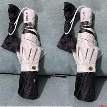 Salt umbrella French Hepburn wind black and white two-color spell umbrella Female folding barometer rain dual-use INS sun umbrella sunscreen