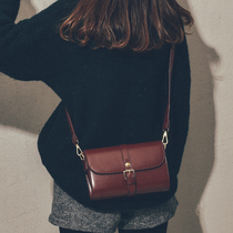 Hong Kong 2021 new leather womens bag Korean version of the versatile cross-body bag simple shoulder bag retro mini small square bag tide