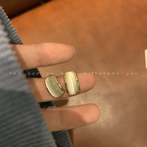 Light luxury exquisite cat eye stone silver needle earrings female ins niche design sense Super Fairy earrings Net Red cold wind earrings