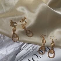 South Korea long cat's eye water drop earrings female temperament girl style modified face ear-less earrings Joker earrings