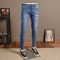 Summer light blue mens jeans elastic body surgings Korean version trendy small feet pants high-end tide cards casual long pants