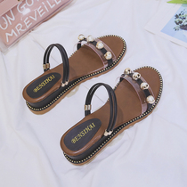 Sandals female 2020 Summer new wild wear two Net red Hugh Dadong leisure fairy wind slope with Pearl a word cool