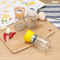 The manual pepper grinder is now grinding the pepper and