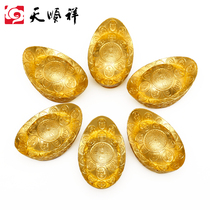 Alloy solid gold ingot burial goods next to the urn box