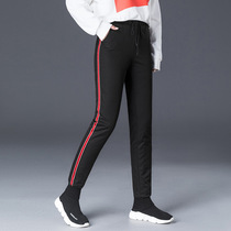 Winter Harbin Mohe tourism equipment waterproof thickened down pants to the snow town Changbai Mountain warm sports pants women