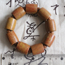 Surabaya rich red large Bianstone Tongluo hand string stone drum shape Diamond Sutra suction money