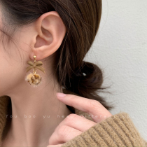 Autumn and winter BAO WEN bow hair ball earrings female Korean temperament Net red earrings 2021 New Tide plush earrings