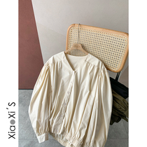 Xiao Xijia) Korean version of temperament V-collar single-breasted bubble sleeve shirt women loose thin long sleeve shirt foreign-style shirt