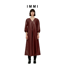 (Designer brand IMMI) show the same burgundy three-point sleeve PU halter dress 192DS021X