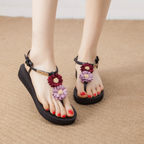 Cool female summer 2021 new Joker slope with thick bottom outside wearing Bohemia seaside holiday flower fairy sandals