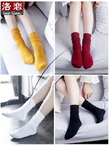 Students pile up socks Girls season trend cotton Korean black and white push Korean version of yellow medium long tube high waist