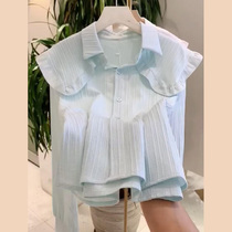 Honey color Xuan lazy wind blue shirt women 2022 autumn and winter new high-end design niche doll collar top