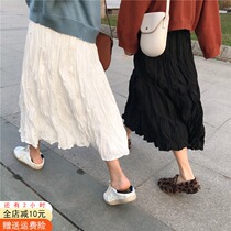  2021 new half-length skirt female spring and autumn a-line high waist design sense niche white pleated winter black long skirt