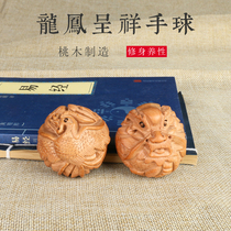 Peach wood dragon phoenix brave hands hands play handball give old people gifts wood carving