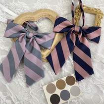 (Tokyo twenties remember) Korean striped original spring and autumn printed college wind butterfly knot shirt dirty powder neckline