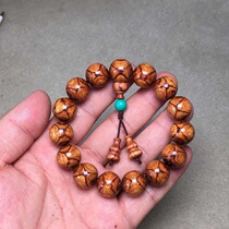 Hainan Huanghuali old material oil pear Kangli sea yellow 15 hand string Buddha beads X pattern pair of eyes grimace ghost eye bracelet men and women