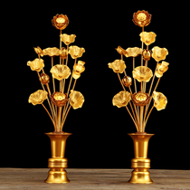 A pair of gilt painted aluminum vases simulation fake bouquets for Buddha lotus lotus flowers in front of the Buddha