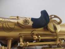 Saxophone hand hook thumb sleeve midrange treble tenor saxophone thumb drag Universal