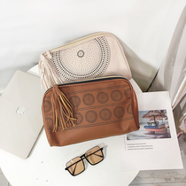 Export European and American fashion carved hollow large hand bag female street retro tassel bag cosmetic bag