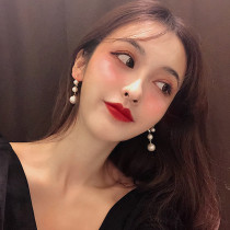 European and American retro elegant long size pearl earrings female autumn and winter temperament exaggerated suitable for round face earrings tide