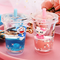 Creative cute female liquid quicksand milk tea cup car keychain kitten doll floating bag pendant ornaments