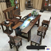 Old boat wood tea table meets guest kung fu tea table fish raising tea art table Chinese Zen solid wood furniture courtyard flowing water tea table