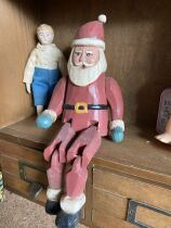 Old goods Santa Claus a handmade wooden sculpted Christmas gift doll