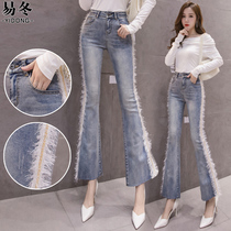 Winter new gush microlao jeans female splicing feather splicing temperament Trumpet Pants Tide