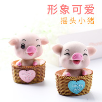 Personality net red shaking his head pig car ornaments Creative cute cute pet decorations Auspicious fruit aromatherapy seat car