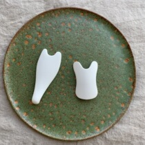 Ceramic scraping plate pull tight small face leg face body turbidity