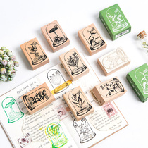 Preferential creative wishing bottle plant wooden seal light retro hand account printing decorative hand account material tool