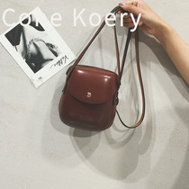 French flagship genuine leather shell bag women 2022 new wave mini small bag minimalist mobile phone bag single shoulder female inclined satchel bag