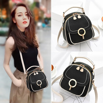 Hong Kong boomer 2021 new genuine leather double shoulder backpack female hand single shoulder bag popular foreign air slanted satchel female pet