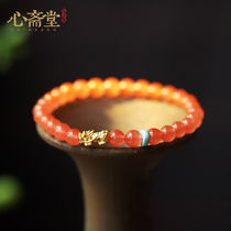Xin Zhaitang (town year old) natural cherry red southern red agate hand string female golden cow bracelet ins niche design