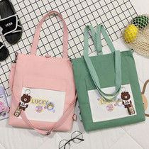 Elementary school childrens light bag girl simple ultralight and large capacity inclined satchel canvas bag one third to sixth grade