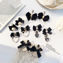 Korean version of celebrities black exaggerated retro earrings bow rhinestone ins simple personality earrings long earrings