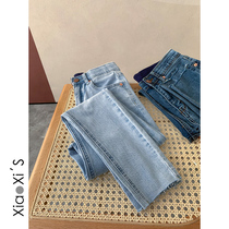 Xiao Xijia) Light blue wash water polished white burrs elastic slim nine-point jeans bottoming small feet pencil pants women