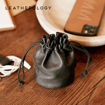 Genuine leather stereo pumping rope containing AirPods digital round bottom leather bag beamline headphone bag data line make-up bag