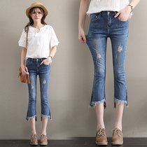 Hong Kong 2021 summer hole Capri pants womens jeans New Korean version of high waist 7 micro flared pants tassel tide