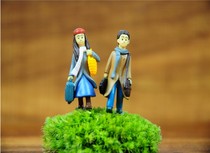 To the left right couple boys Moss micro landscape decoration potted succulents decorative building models person