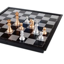 Gold and silver magnetic chess 4812 - A medium folding board magnet 3810 - A trumpet