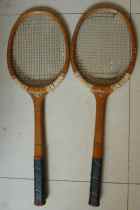 Old wooden tennis racket collection big famous brand wooden tennis match shot pair