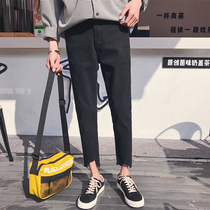 Hong Kong style spring new black thin mens nine-point pants Korean version handsome chic flash-edged small feet pants jeans