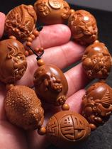 Nuclear carving fan Su Gong famous Gu Yuanzhi works six beasts Nafu pure handmade old oil nuclear carving