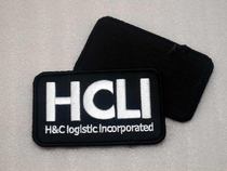 Queen of Arms Jormungand surrounding HCLI Hecmatial Corporate Badge
