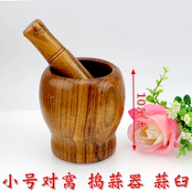 A small bamboo wood garlic mashing machine garlic padded garlic Pat garlic jar grinding machine garlic mortar